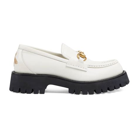 gucci loafers white slipper|Gucci suede loafer.